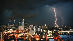 A city at night with lightening.