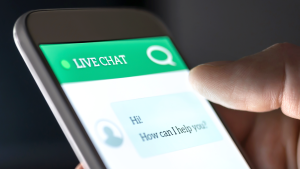 Person using a smartphone for live chat.