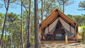 A glamping tent in the woods.